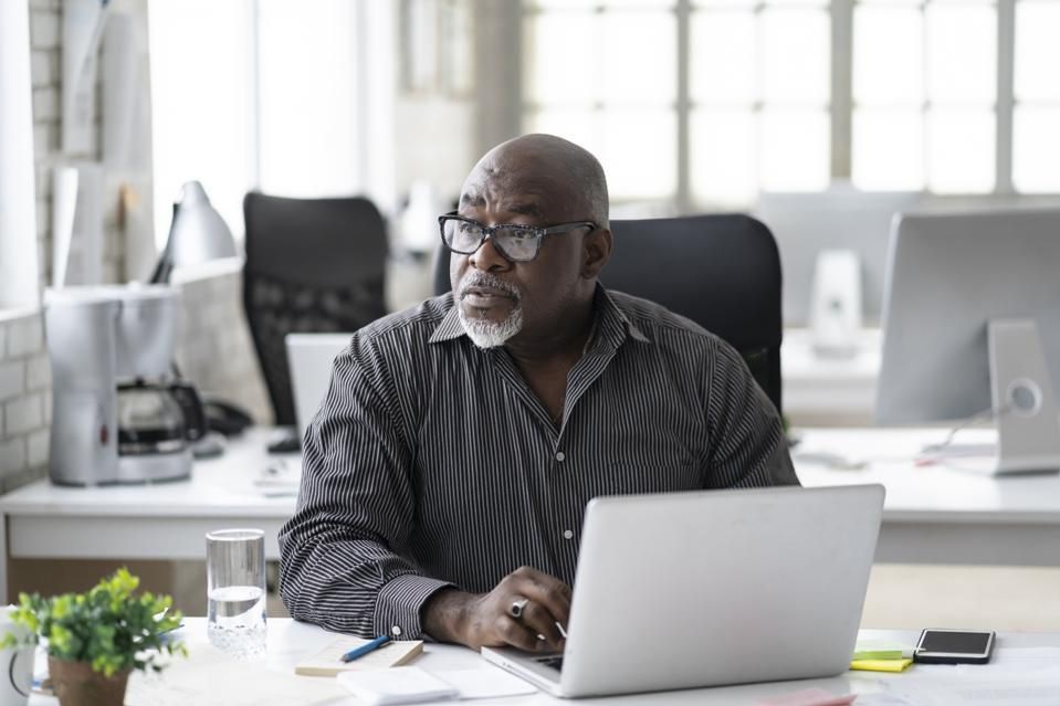 Project Management - man sitting in his office
